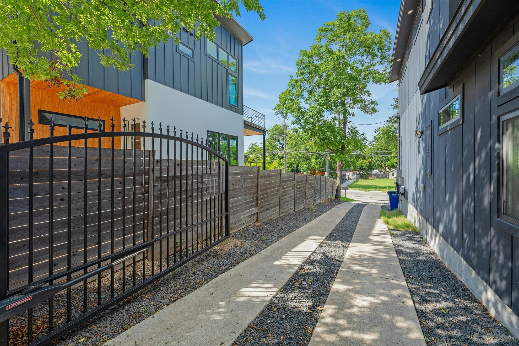 4606 Ledesma Road, Unit 2 Austin, TX 78721 - Photo 28 of 33 Secure entry to a contemporary dwelling with a private drive, offering ample off-street parking.