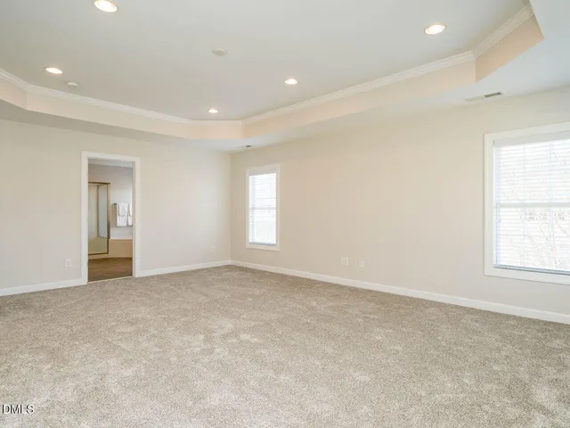 a bathroom with a sink double vanity and a mirror