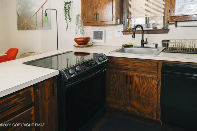 a bedroom with a bed and a mirror