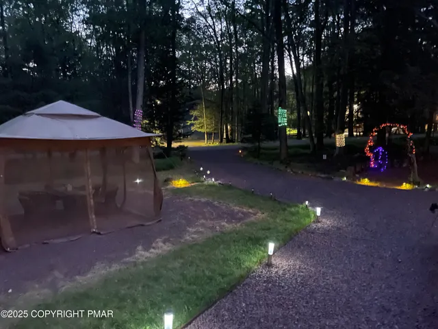 a view of a park with swings and slides