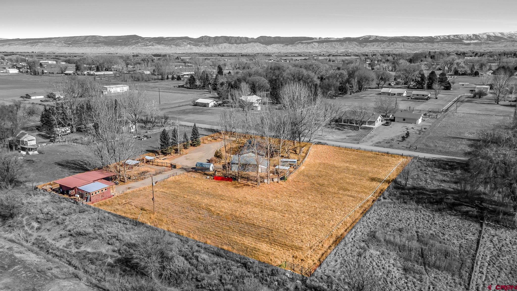 15098 6160th Road Montrose, CO 81403 - Photo 30 of 30 a view of a backyard with a lake view