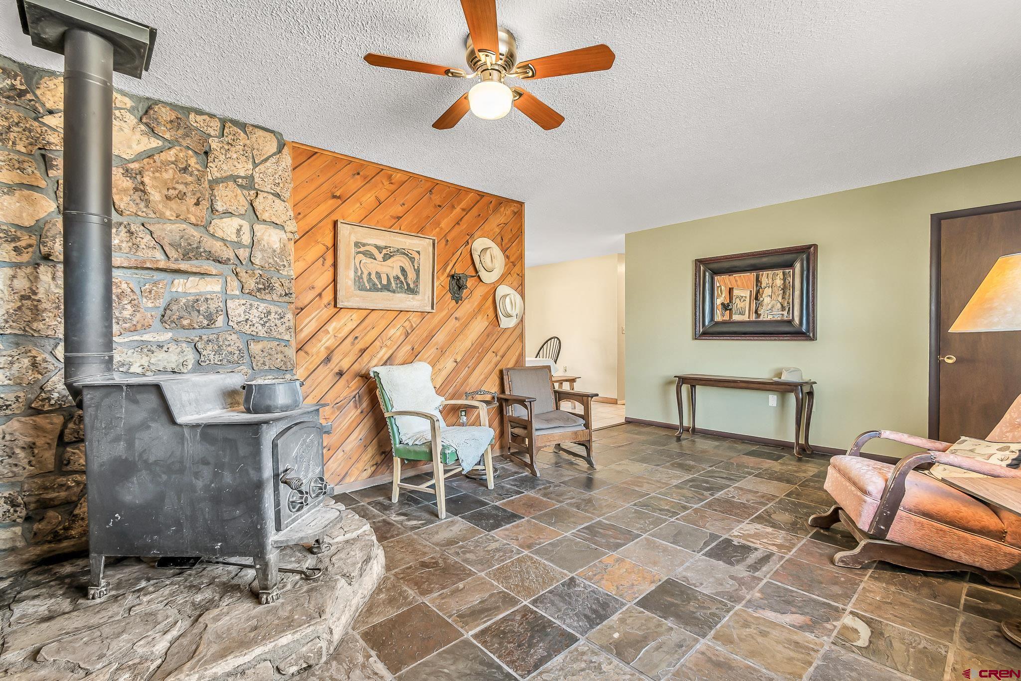 15098 6160th Road Montrose, CO 81403 - Photo 5 of 30 a bedroom with furniture and a rug