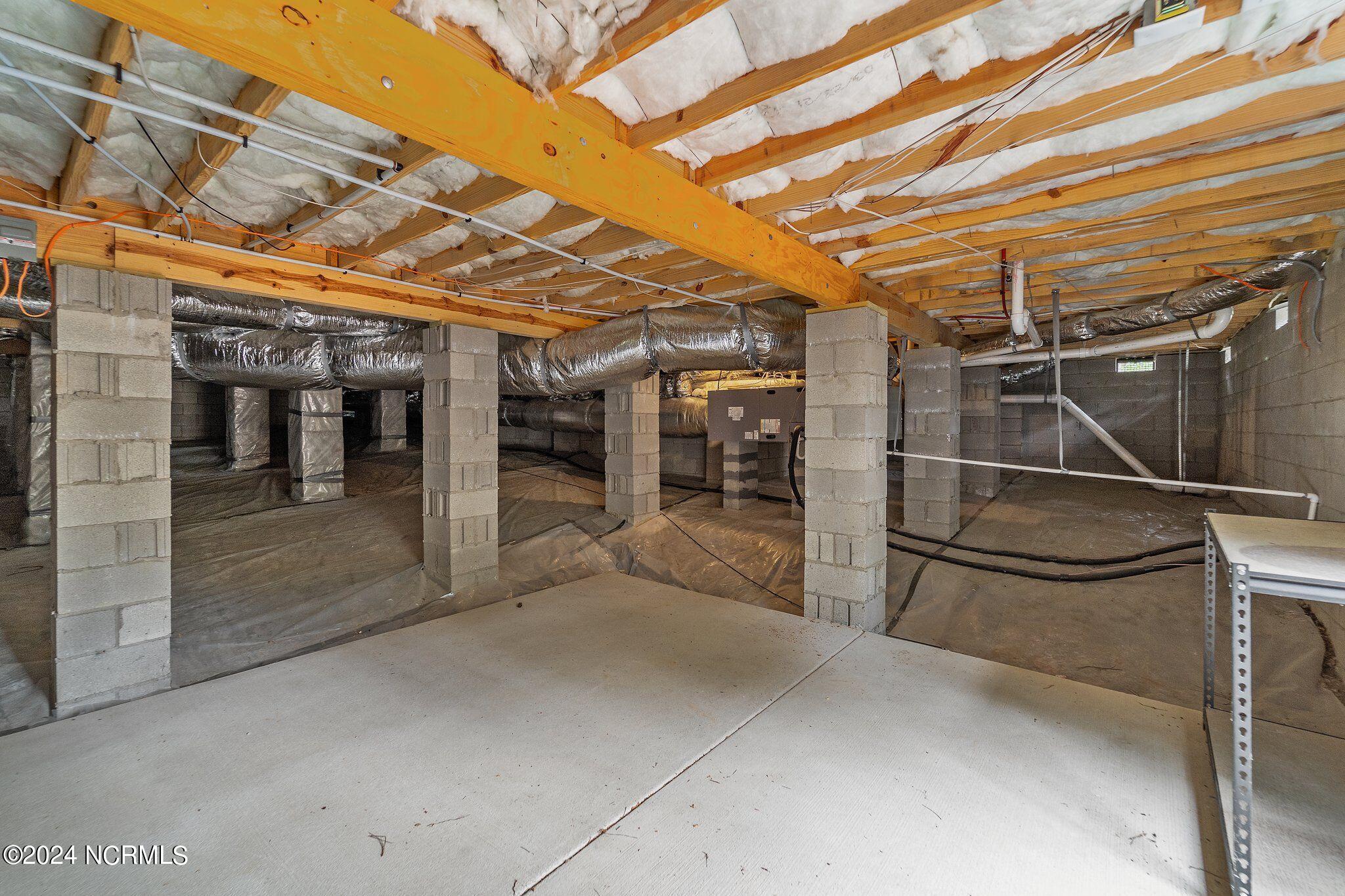 2 Buckhorn Road Jackson Springs, NC 27281 - Photo 51 of 56 Concrete slab in the crawlspace (shelving conveys)