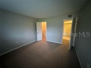 1695 Lee Road, Unit C110 Winter Park, FL 32789 - Photo 5 of 12 a view of empty room with window