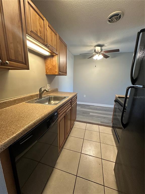 1695 Lee Road, Unit C110 Winter Park, FL 32789 - Photo 8 of 16 a bathroom with a sink a mirror and a shower