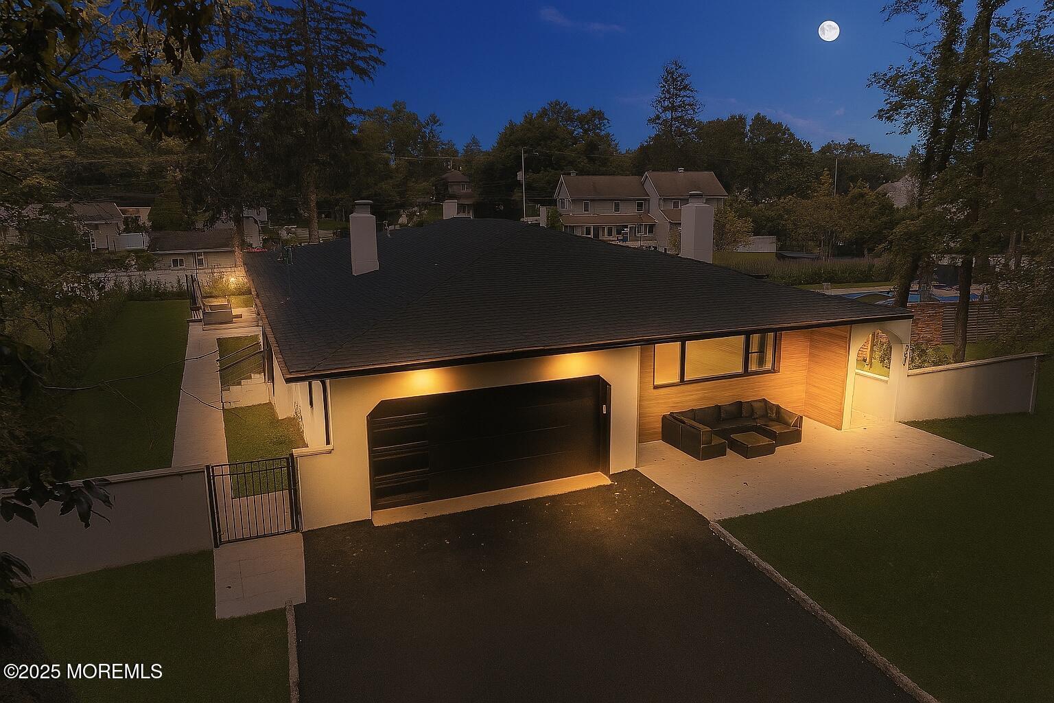 441 Slocum Place Oakhurst, NJ 07755 - Photo 2 of 61 a view of a balcony and a fireplace