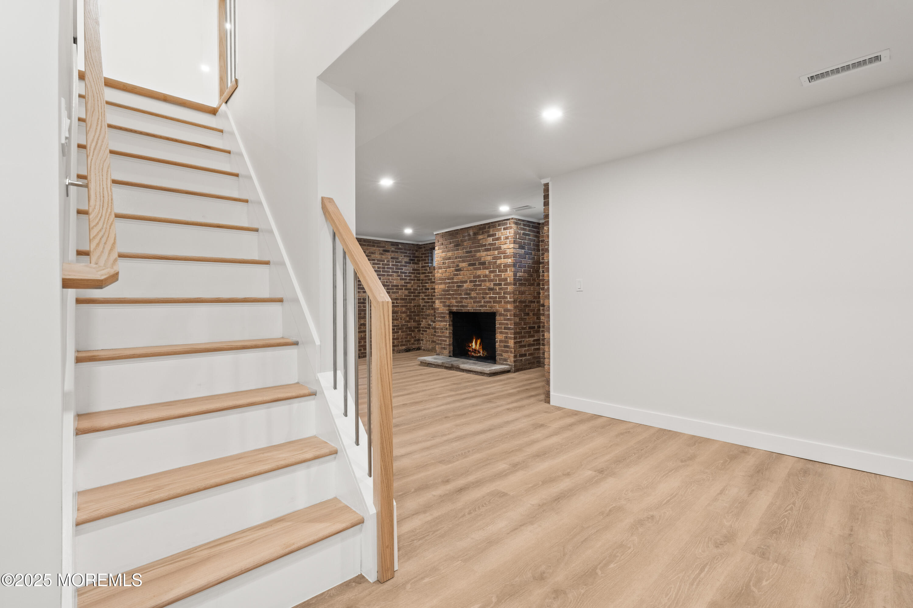 441 Slocum Place Oakhurst, NJ 07755 - Photo 42 of 61 a view of entryway with wooden floor