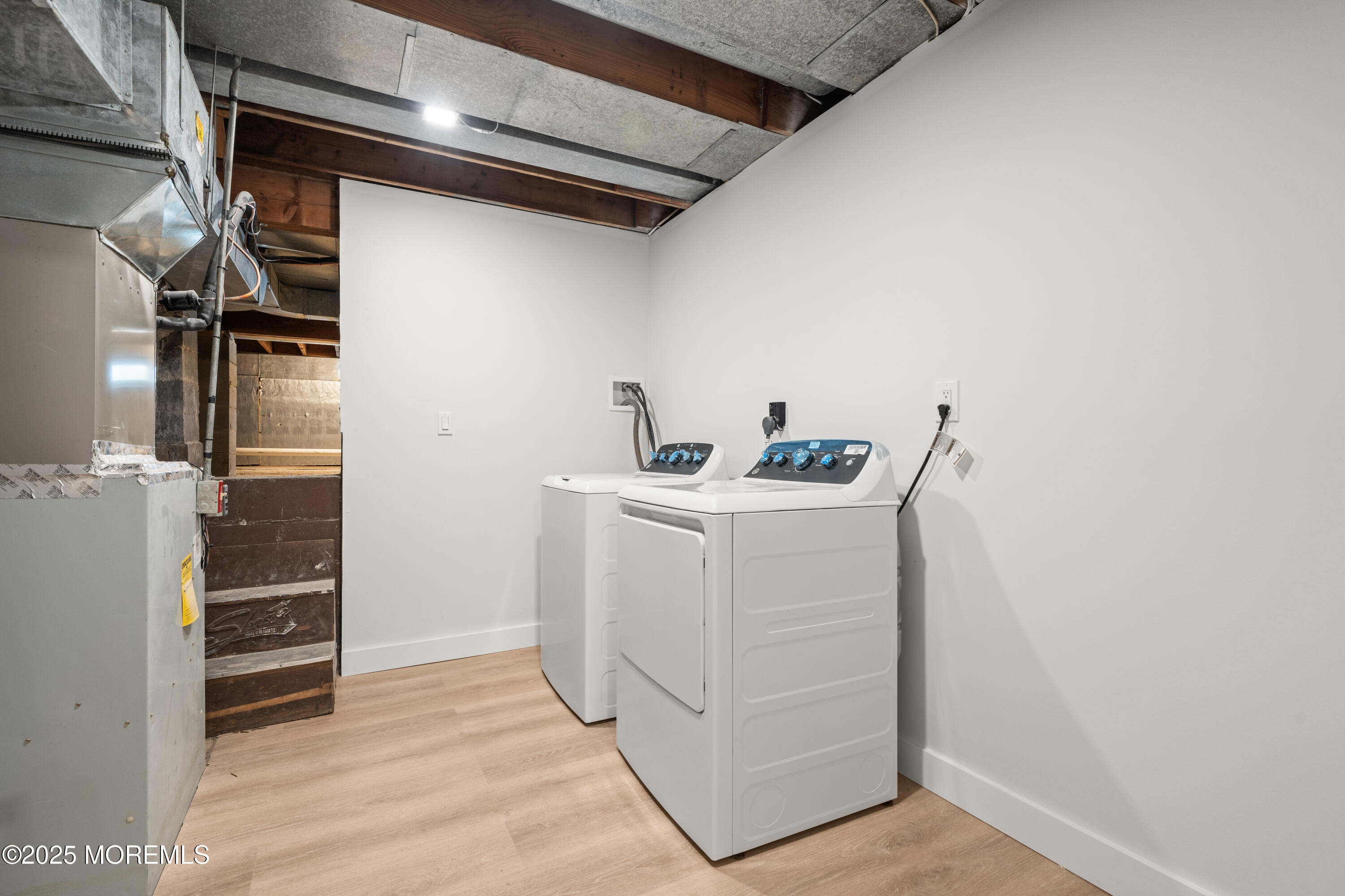441 Slocum Place Oakhurst, NJ 07755 - Photo 49 of 61 a utility room with dryer and washer