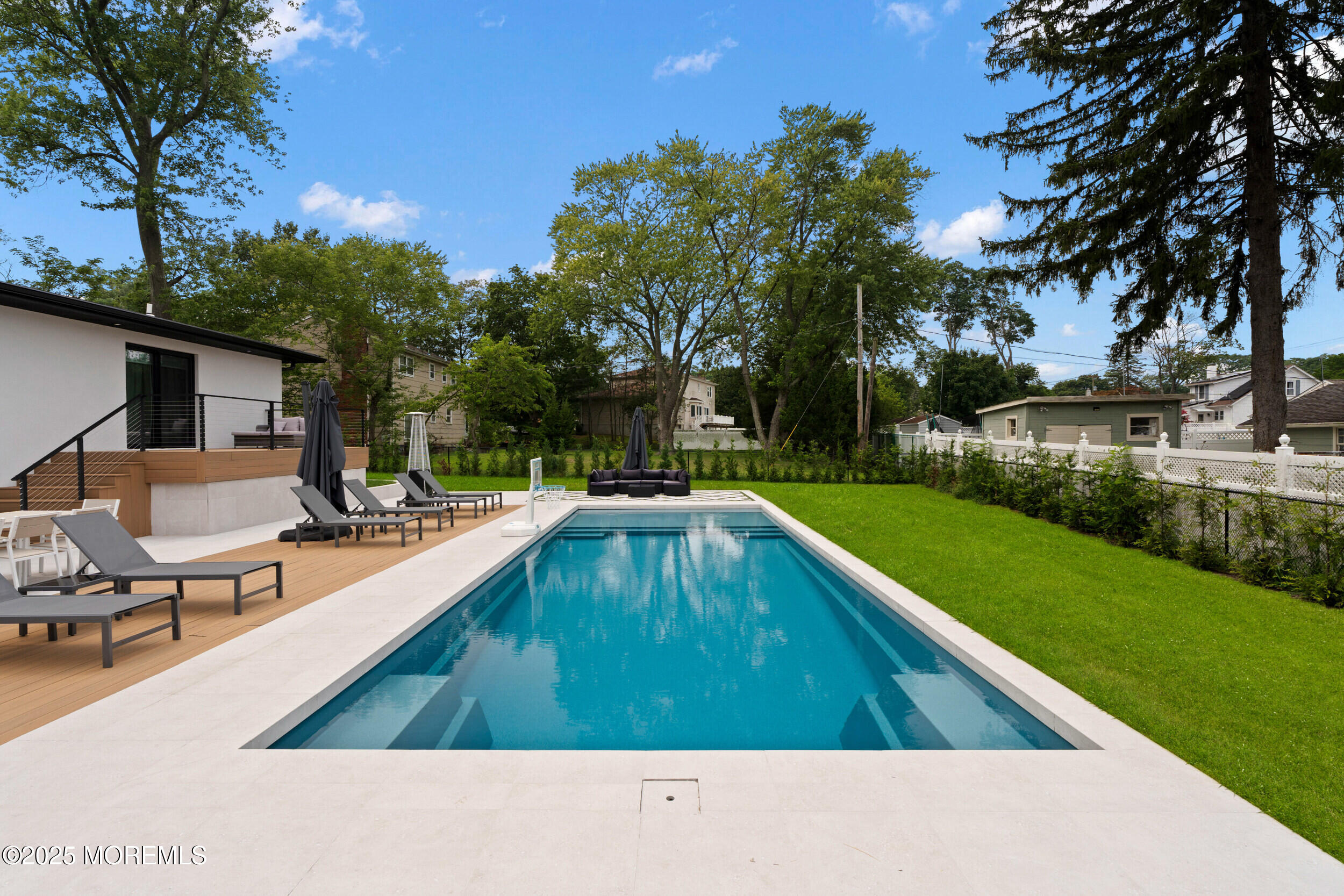 441 Slocum Place Oakhurst, NJ 07755 - Photo 52 of 61 a view of swimming pool with chairs