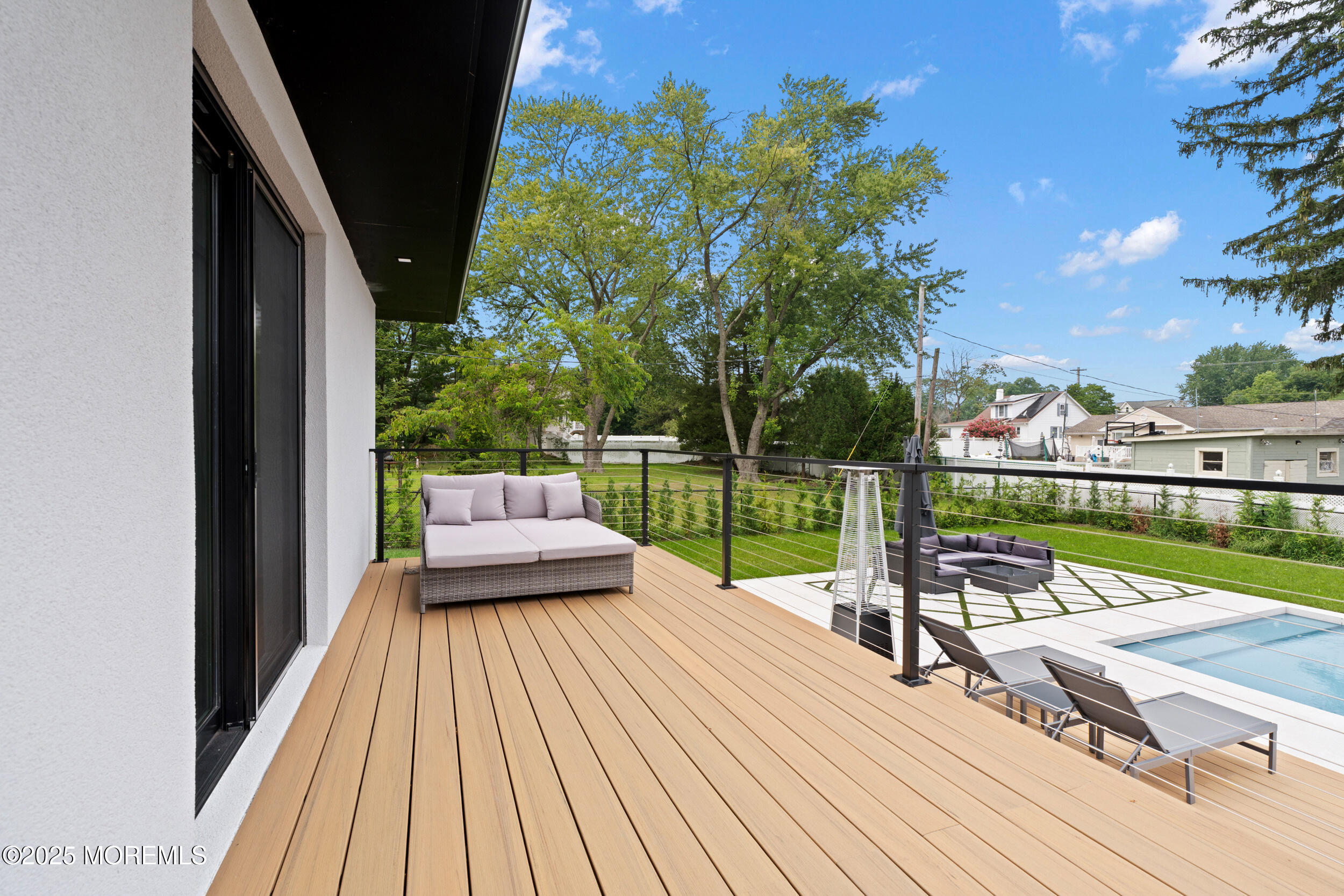 441 Slocum Place Oakhurst, NJ 07755 - Photo 53 of 61 a view of a deck with wooden floor and outer view