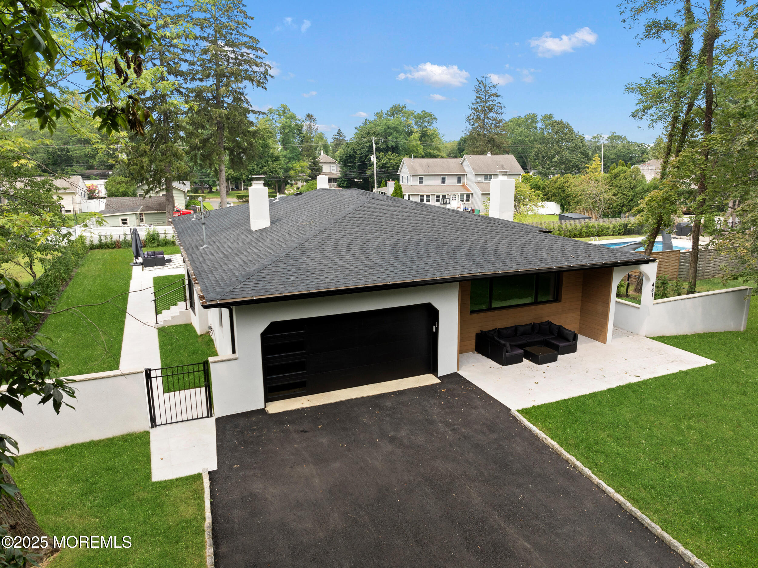 441 Slocum Place Oakhurst, NJ 07755 - Photo 60 of 61 a backyard of a house with seating space