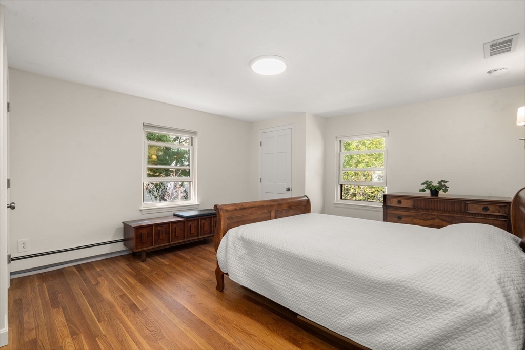 50 Mary Ellen Road Newton, MA 02468 - Photo 10 of 22 a bedroom with a bed and a window