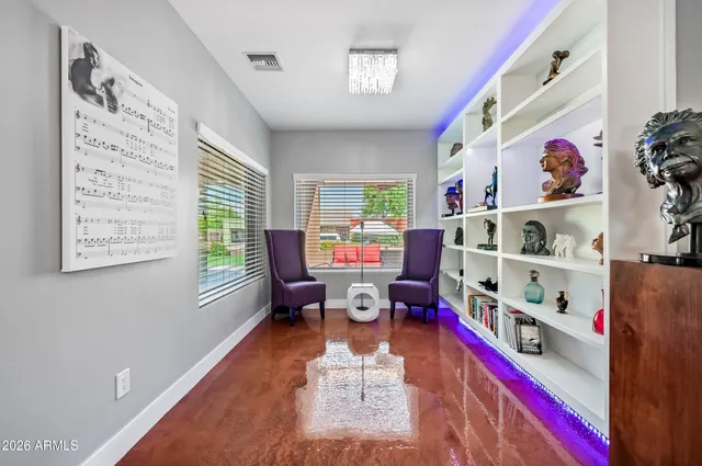 a living room with furniture and a window