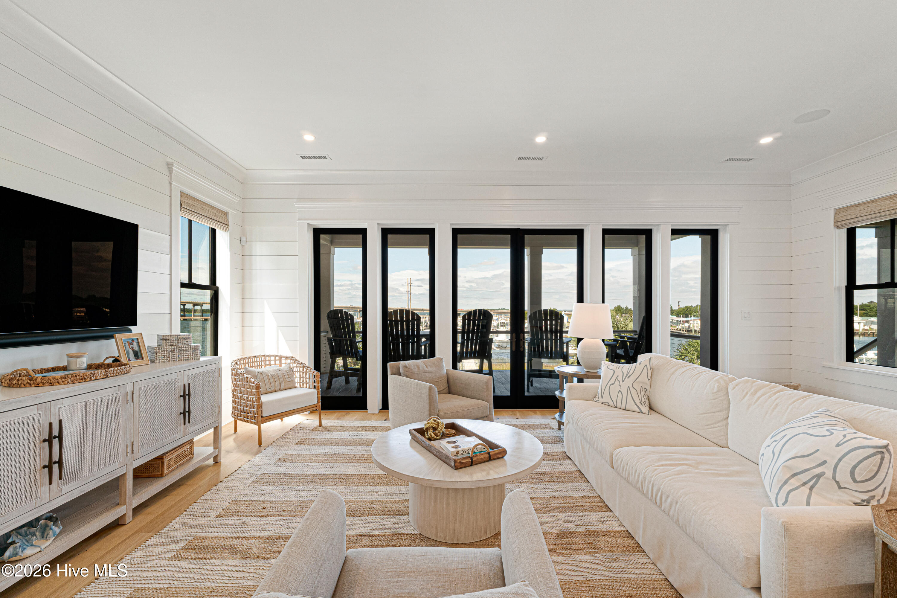 216 Radio Island Road Morehead City, NC 28516 - Photo 6 of 72 Living Room w/ Floor-to-Ceiling Views