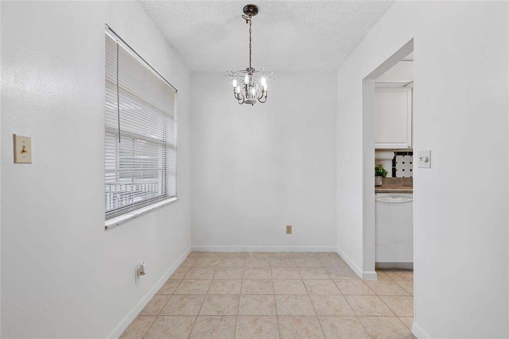1230 Old Boynton Road, Unit 203 Boynton Beach, FL 33426 - Photo 8 of 25 a view of an empty room with a window