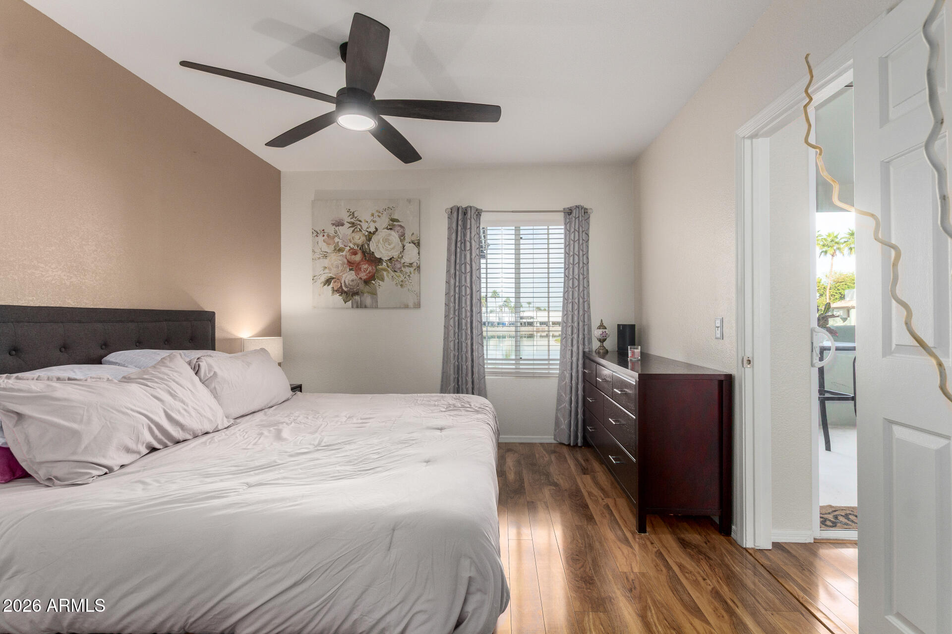 1825 West Ray Road, Unit 2098 Chandler, AZ 85224 - Photo 11 of 30 a bedroom with a bed and a window