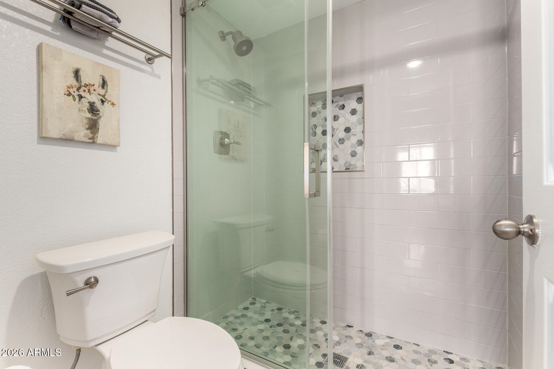 1825 West Ray Road, Unit 2098 Chandler, AZ 85224 - Photo 13 of 30 a bathroom with a toilet a sink and shower