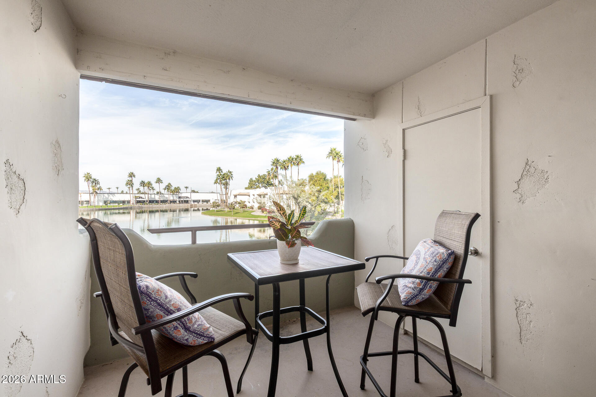 1825 West Ray Road, Unit 2098 Chandler, AZ 85224 - Photo 17 of 30 a view of a dining room with furniture window and outside view