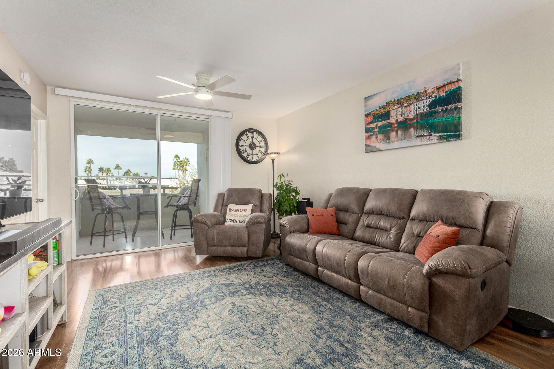 1825 West Ray Road, Unit 2098 Chandler, AZ 85224 - Photo 2 of 30 a living room with furniture and a large window