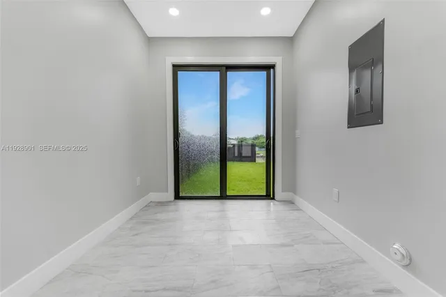 a bathroom with a toilet a sink a vanity and mirror