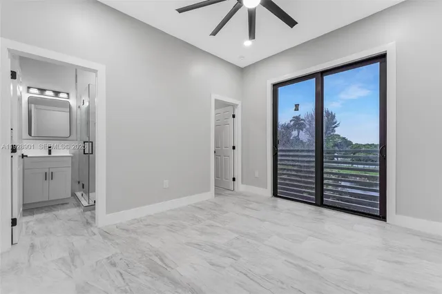 a view of a bathroom with shower