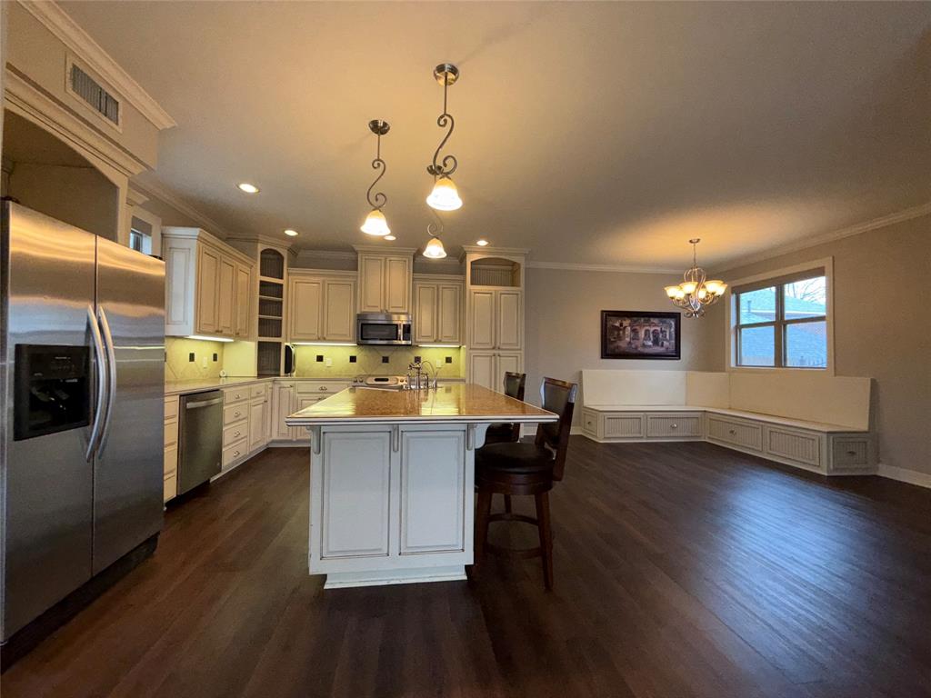 3815 Holly Ridge Drive Longview, TX 75605 - Photo 31 of 40 a kitchen with counter space cabinets and appliances