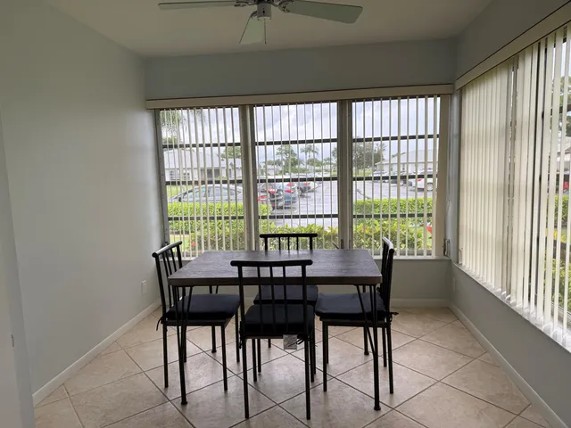 a view of a lake with houses in the back