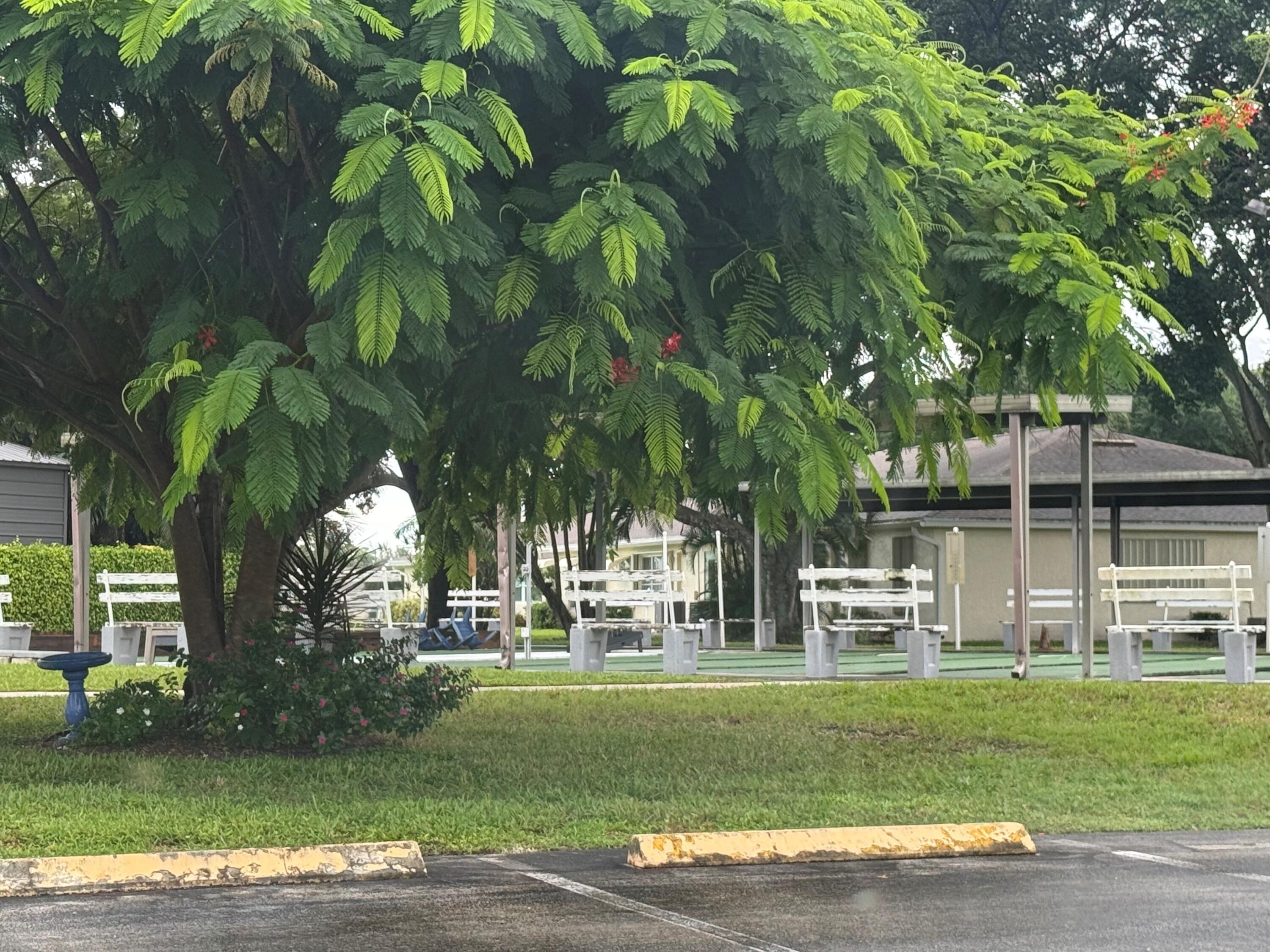 14676 Canalview Drive, Unit A Delray Beach, FL 33484 - Photo 30 of 33 Shuffle Board