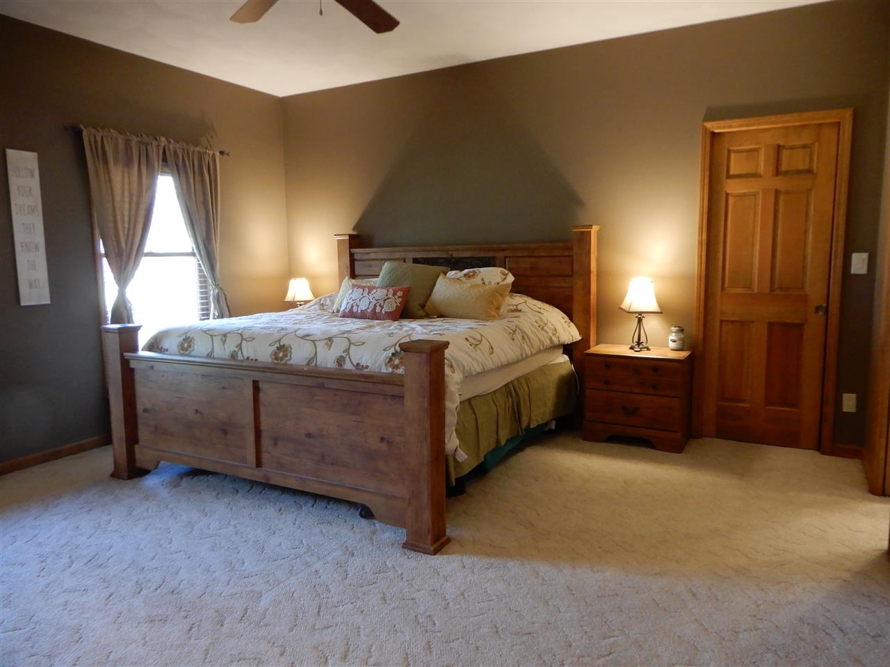 12145 Caledonia Road Belvidere, IL 61008 - Photo 11 of 25 a bedroom with a bed dresser and a window