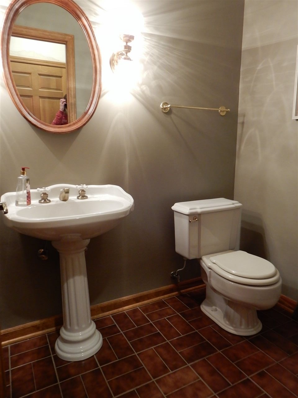 12145 Caledonia Road Belvidere, IL 61008 - Photo 13 of 25 a bathroom with a sink toilet and mirror