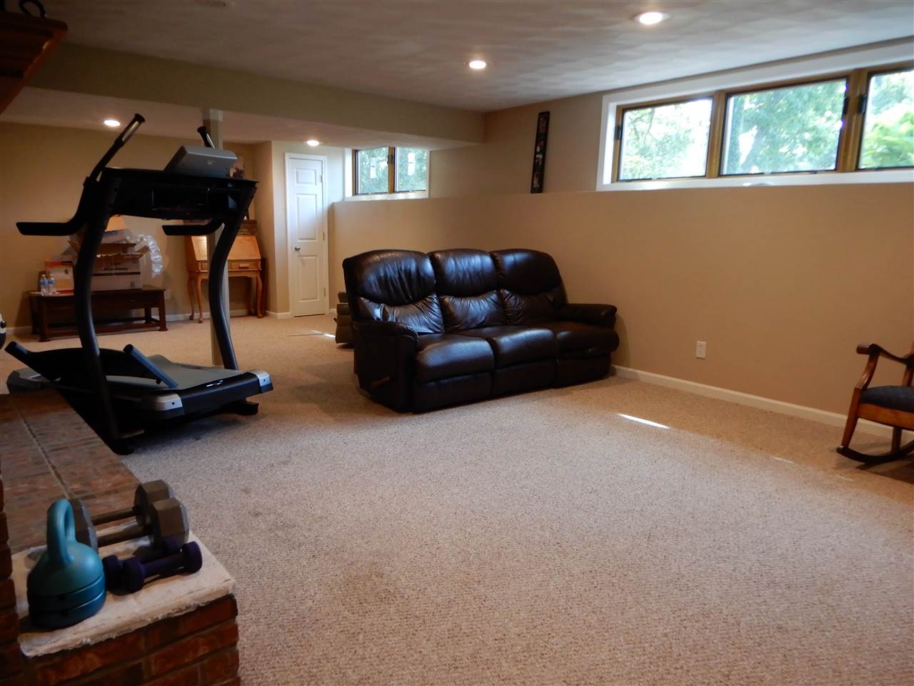 12145 Caledonia Road Belvidere, IL 61008 - Photo 17 of 25 a living room with furniture a air conditioner and a window