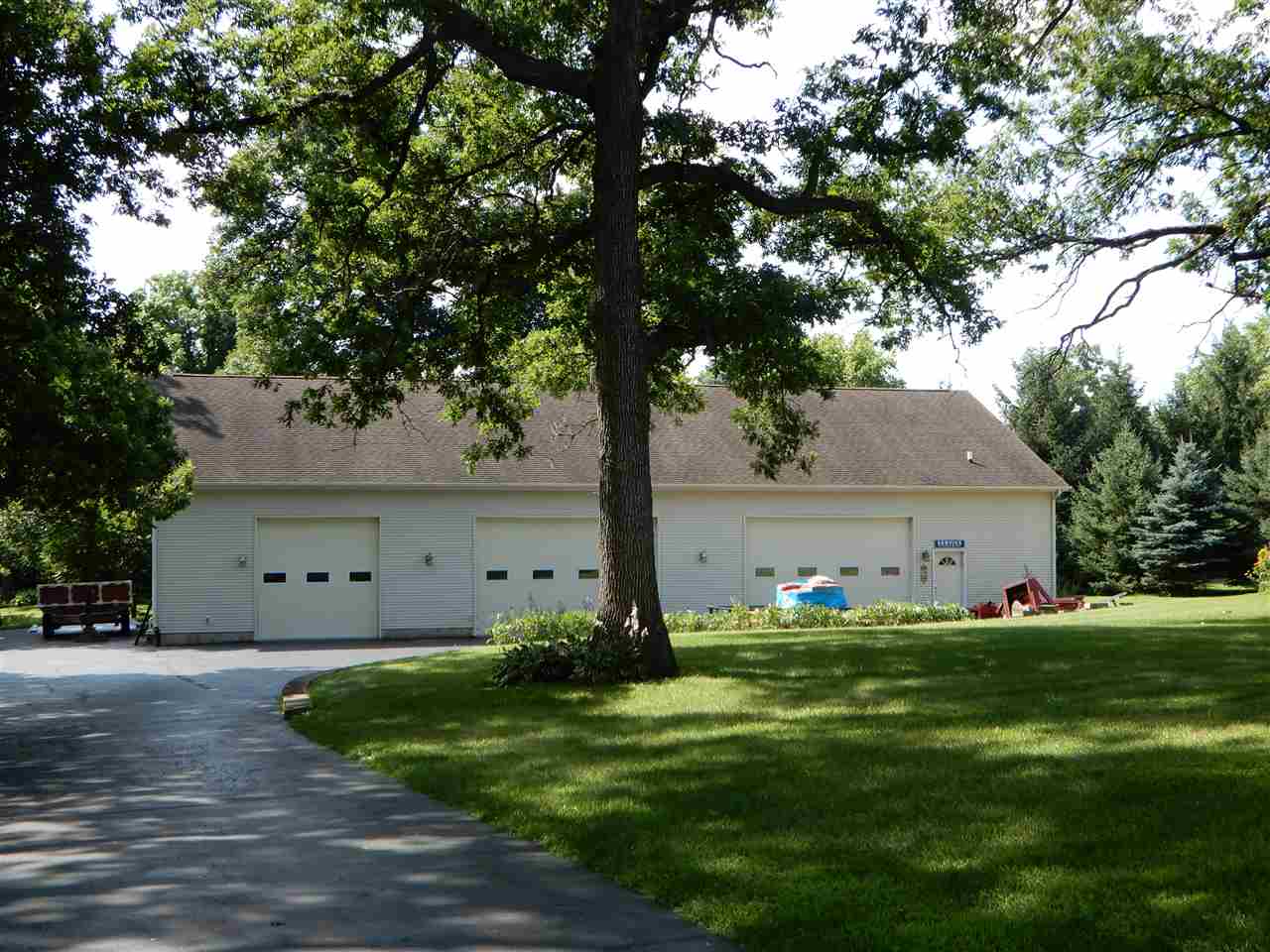 12145 Caledonia Road Belvidere, IL 61008 - Photo 20 of 25 a front view of house with yard