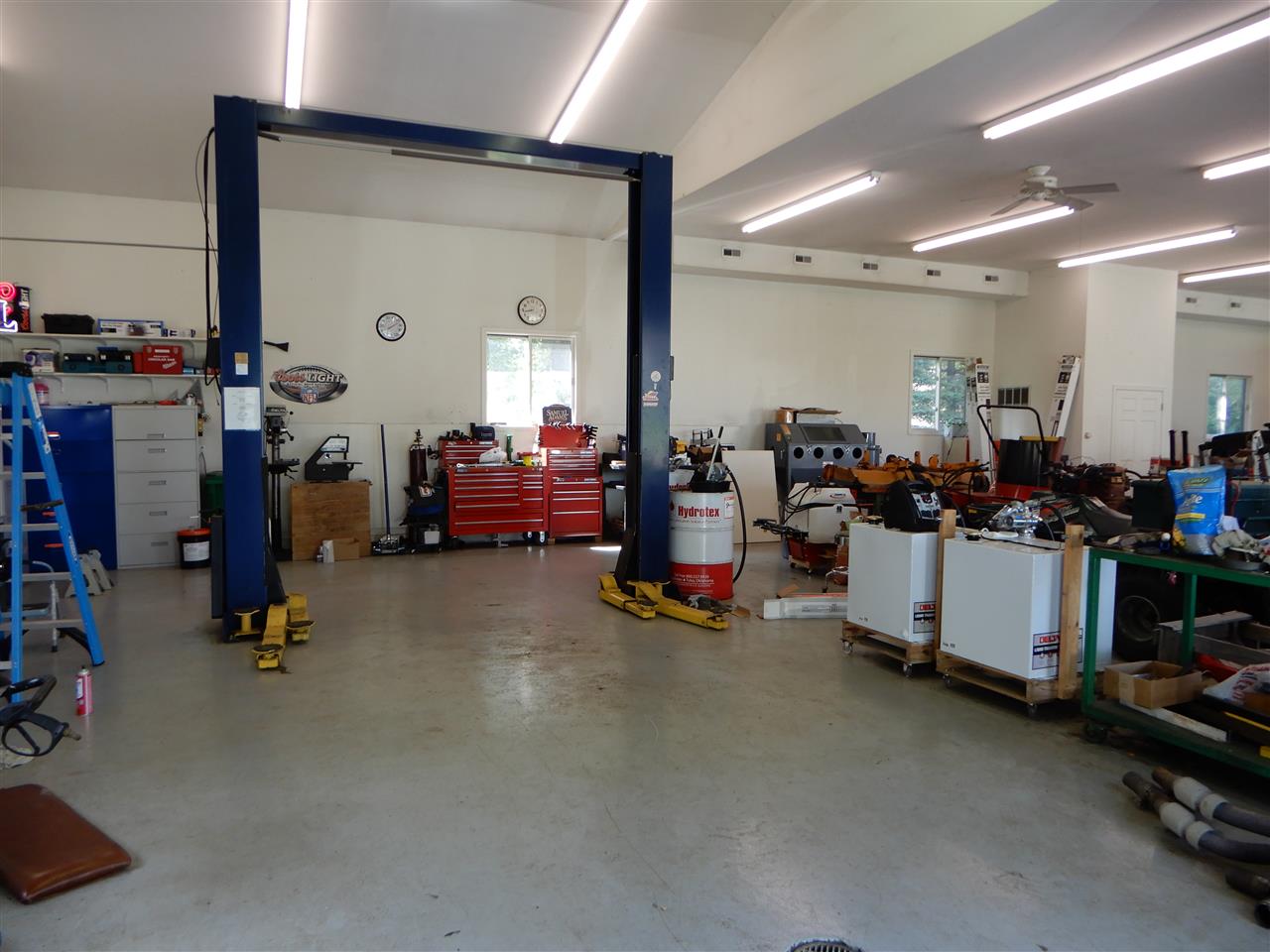 12145 Caledonia Road Belvidere, IL 61008 - Photo 21 of 25 a room with gym equipment and a large window