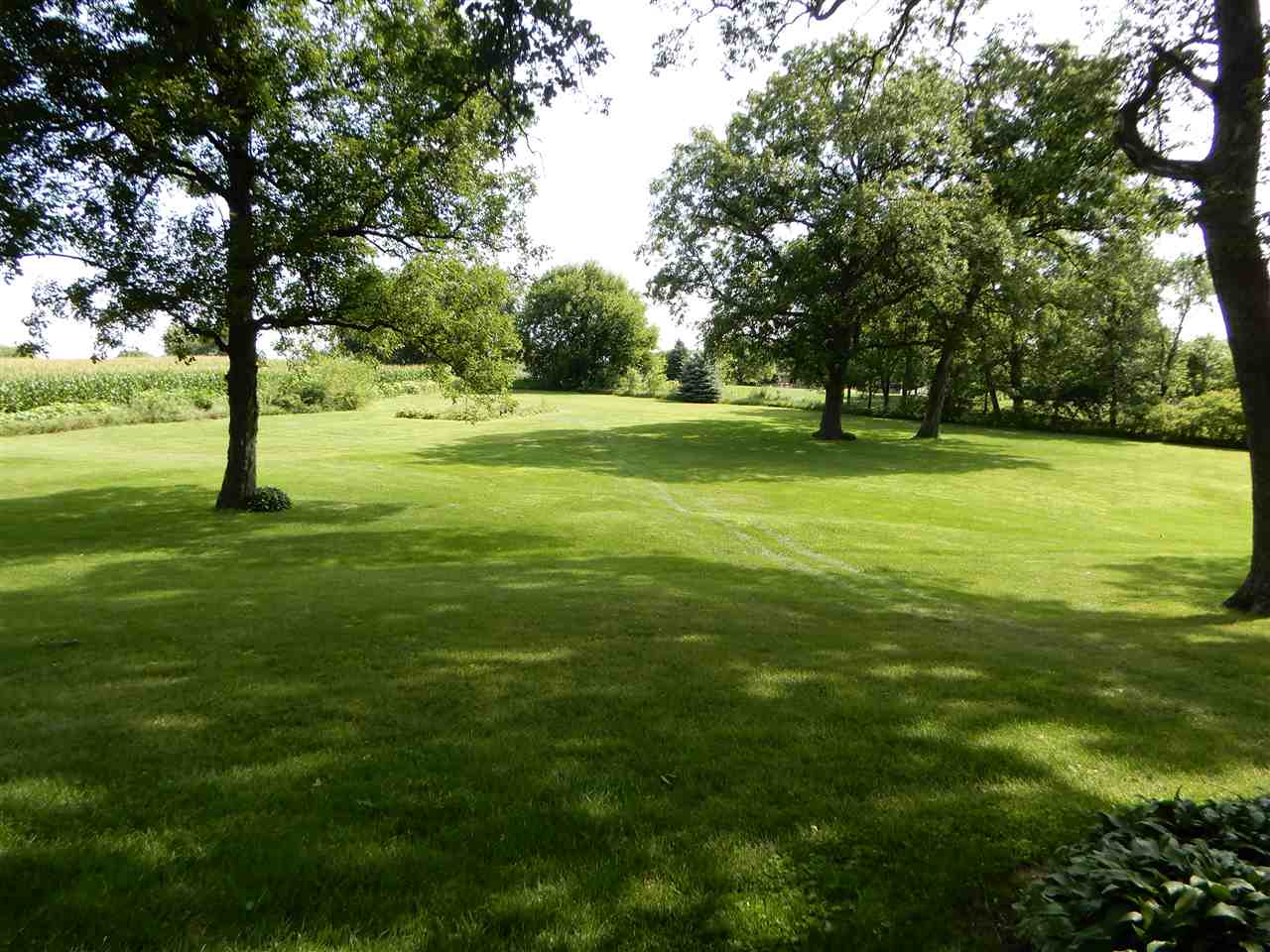 12145 Caledonia Road Belvidere, IL 61008 - Photo 23 of 25 a view of field with trees
