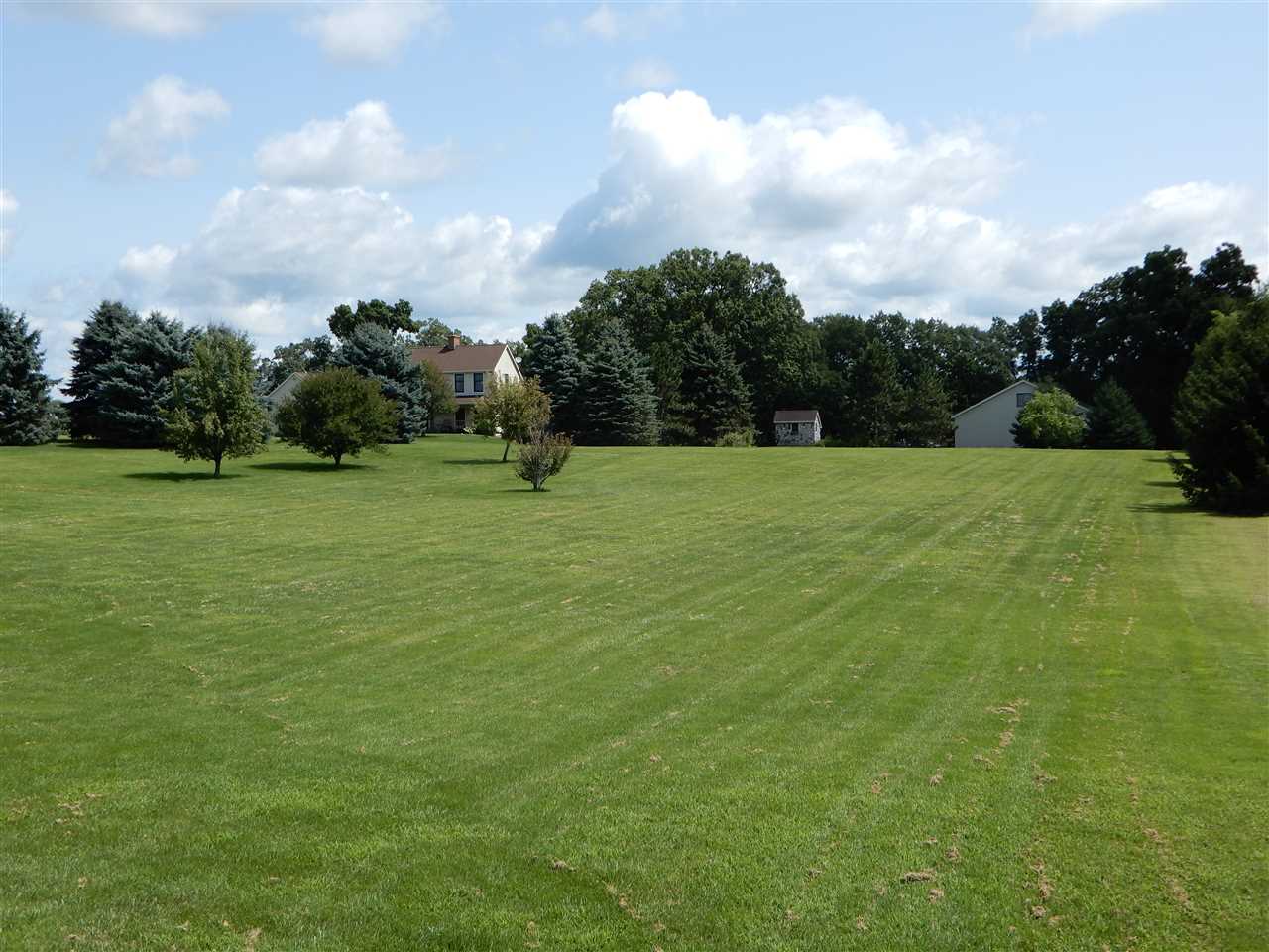 12145 Caledonia Road Belvidere, IL 61008 - Photo 24 of 25 a view of field with tall trees