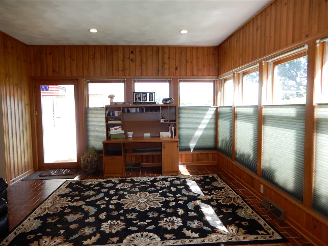 12145 Caledonia Road Belvidere, IL 61008 - Photo 7 of 25 a bedroom with a bed and wooden floor