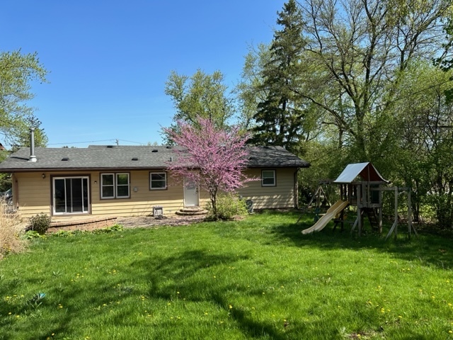 2217 West Palatine Road Inverness, IL 60067 - Photo 12 of 17 a front view of house with yard and green space