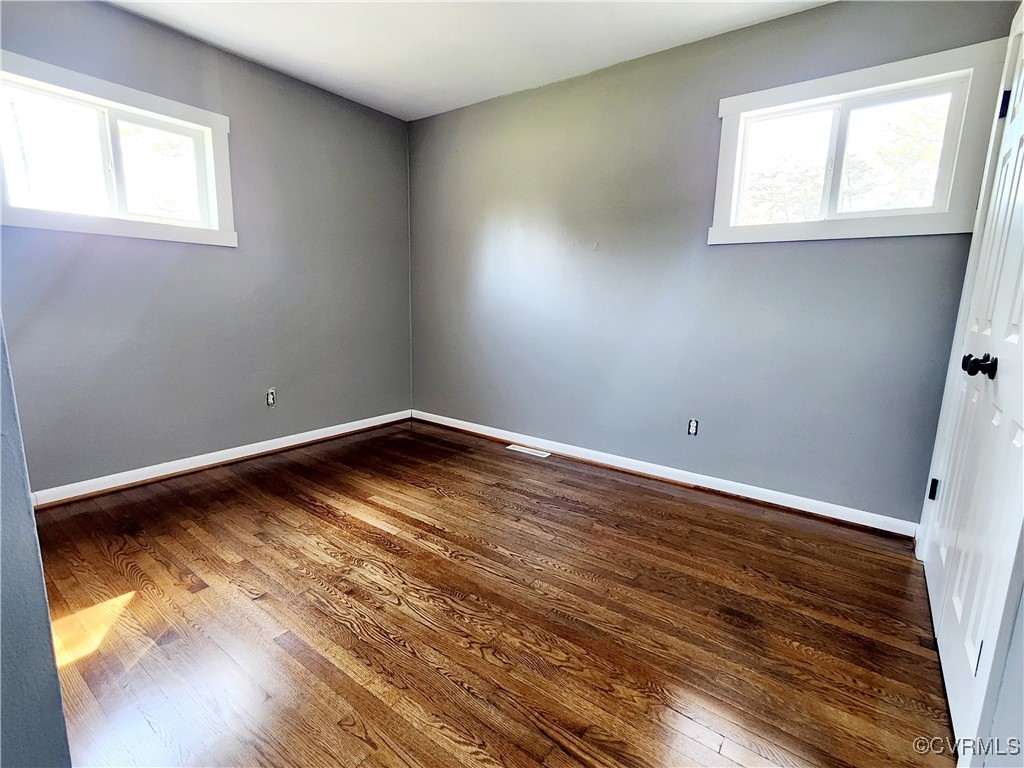2617 Red Lane Road Powhatan, VA 23139 - Photo 23 of 34 Unfurnished room featuring baseboards, dark wood f
