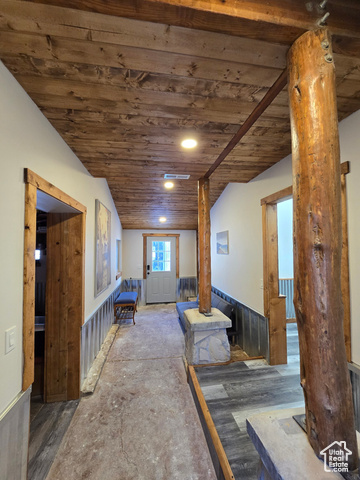 2029 West Tollgate Road Coalville, UT 84017 - Photo 20 of 43 Additional living space featuring a wainscoted wall, wood ceiling, and wood walls