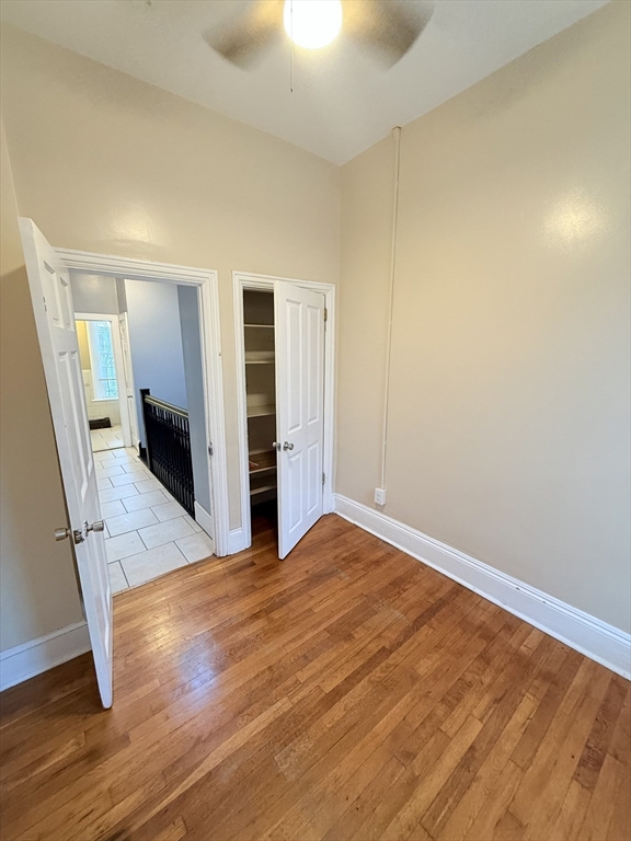 57 Coleman Street, Unit 2 Boston, MA 02125 - Photo 19 of 24 a view of empty room with wooden floor