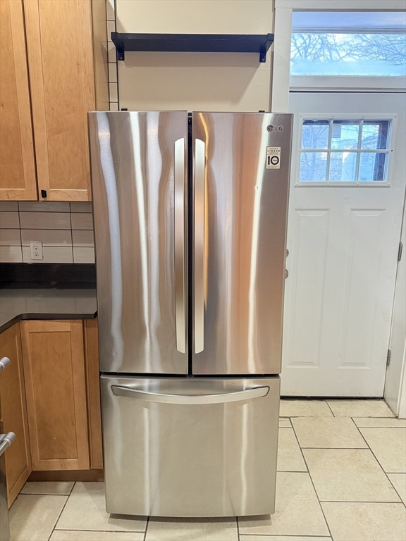 57 Coleman Street, Unit 2 Boston, MA 02125 - Photo 7 of 24 a view of kitchen with a refrigerator