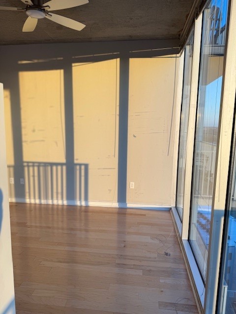 5925 Almeda Road, Unit 11408 Houston, TX 77004 - Photo 15 of 19 a view of an empty room with wooden floor and a window