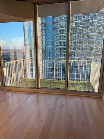 a view of outdoor space with wooden floor