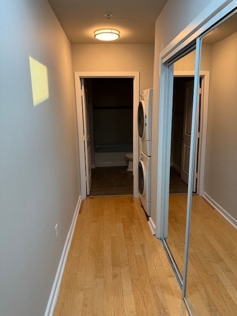 5925 Almeda Road, Unit 11408 Houston, TX 77004 - Photo 4 of 19 a view of a hallway with wooden floor and closet