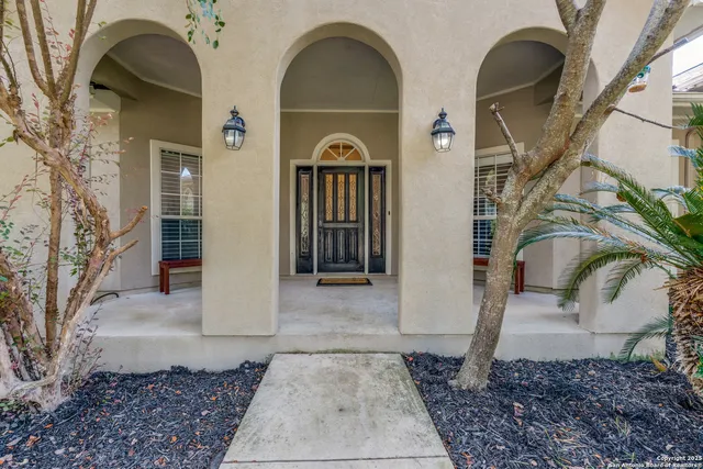 a view of entrance gate of a house