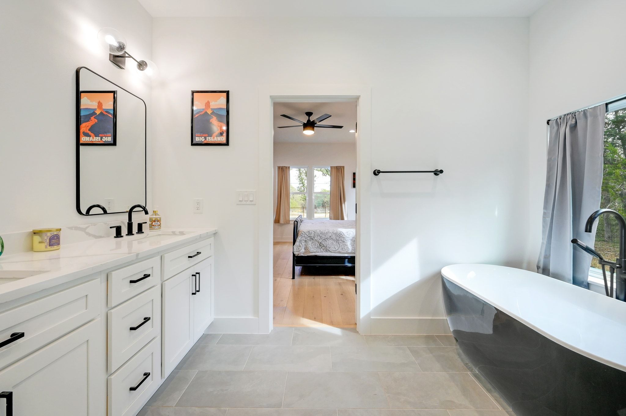 200 Rust Ranch Road Blanco, TX 78606 - Photo 13 of 26 a en suite spacious bathroom with double sink and a mirror