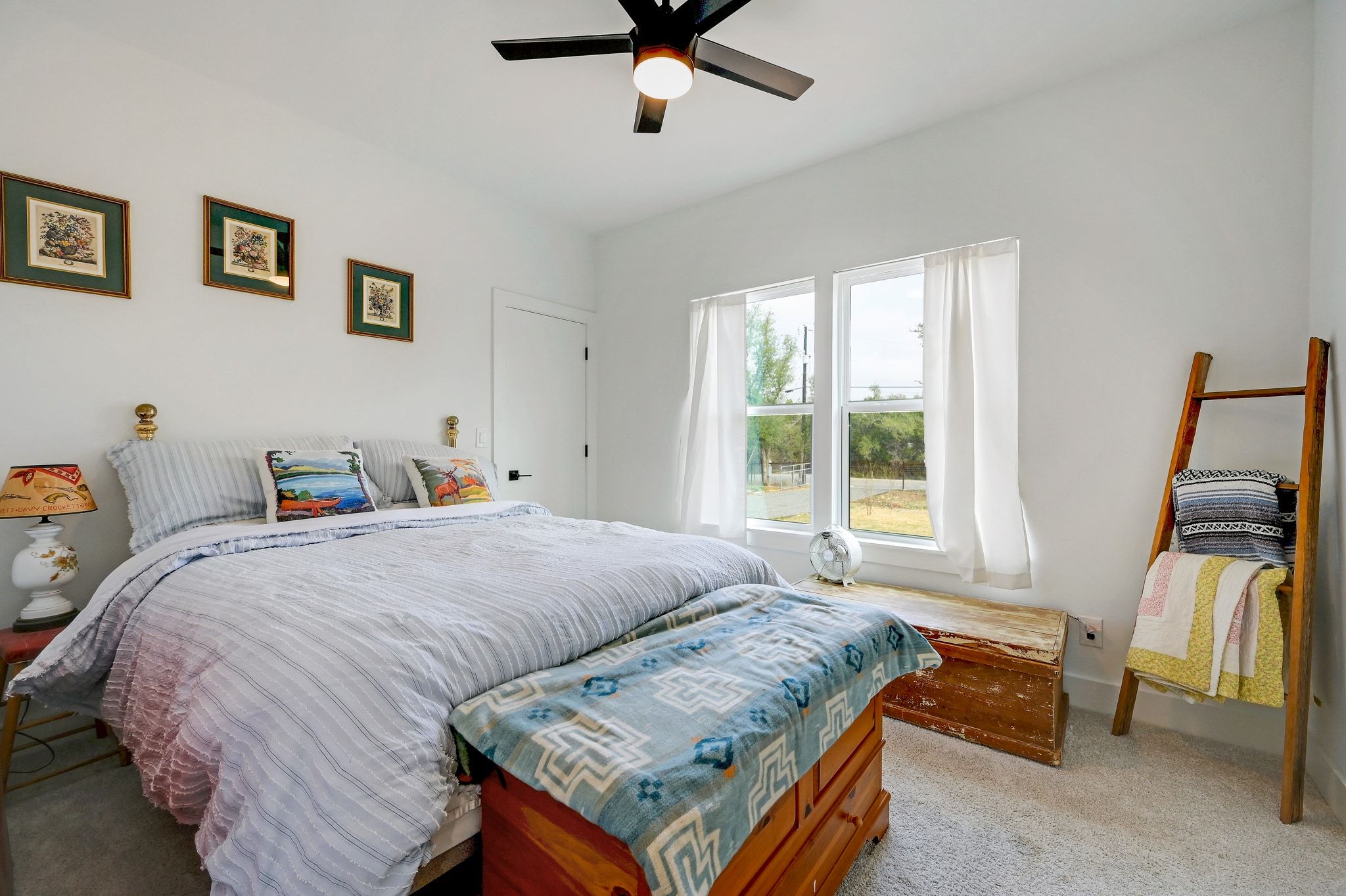 200 Rust Ranch Road Blanco, TX 78606 - Photo 14 of 26 a bedroom with a bed and a window