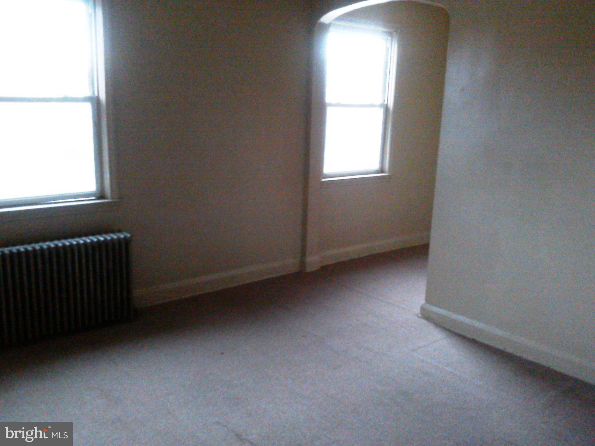 2936 Cornwall Road Dundalk, MD 21222 - Photo 8 of 13 an empty room with a window