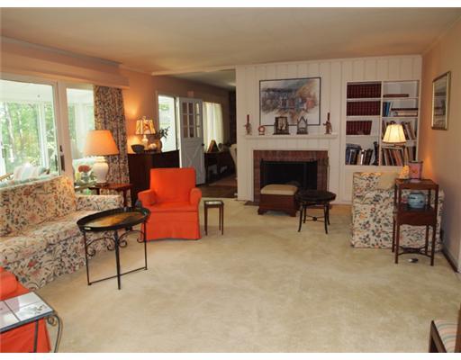 308 Sycamore Road Edgeworth, PA 15143 - Photo 3 of 18 Living Room. One view of the living room; fireplace and built-in cabinetry; wall to wall carpeting; picture window; great size for entertaining!