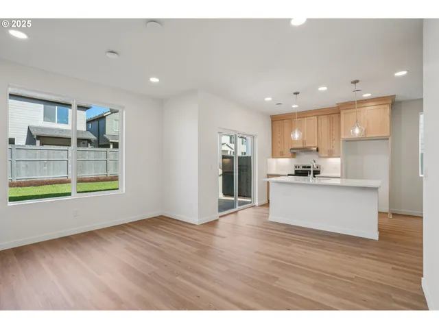 a view of kitchen with wooden floor